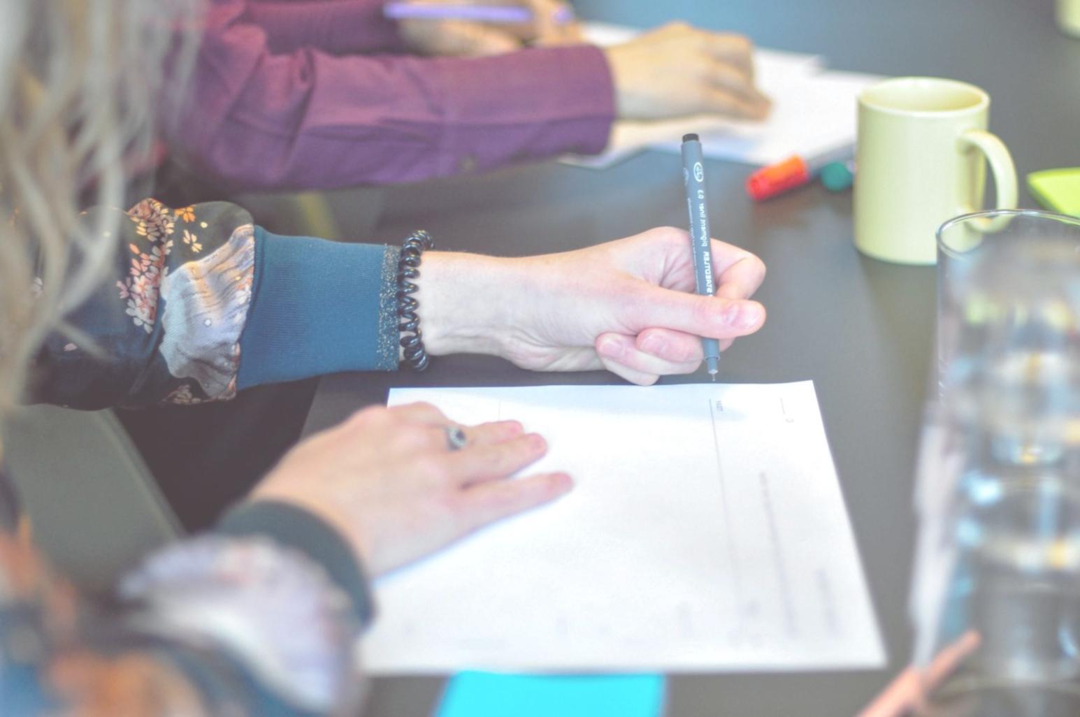 Students collaborating on technical projects in modern learning environment